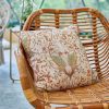 A WOODLAND TRAIL LINEN CUSHION CHAIR